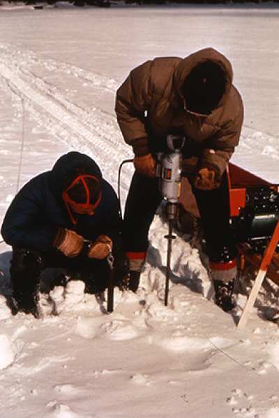 Drilling through ice for soundings